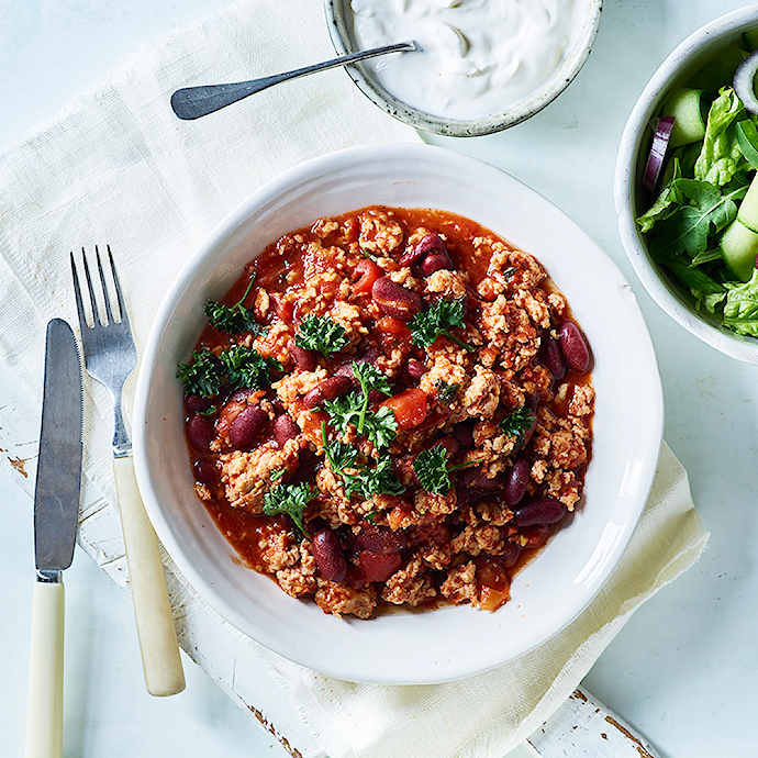 Chiligryde med bønner og cremefraiche